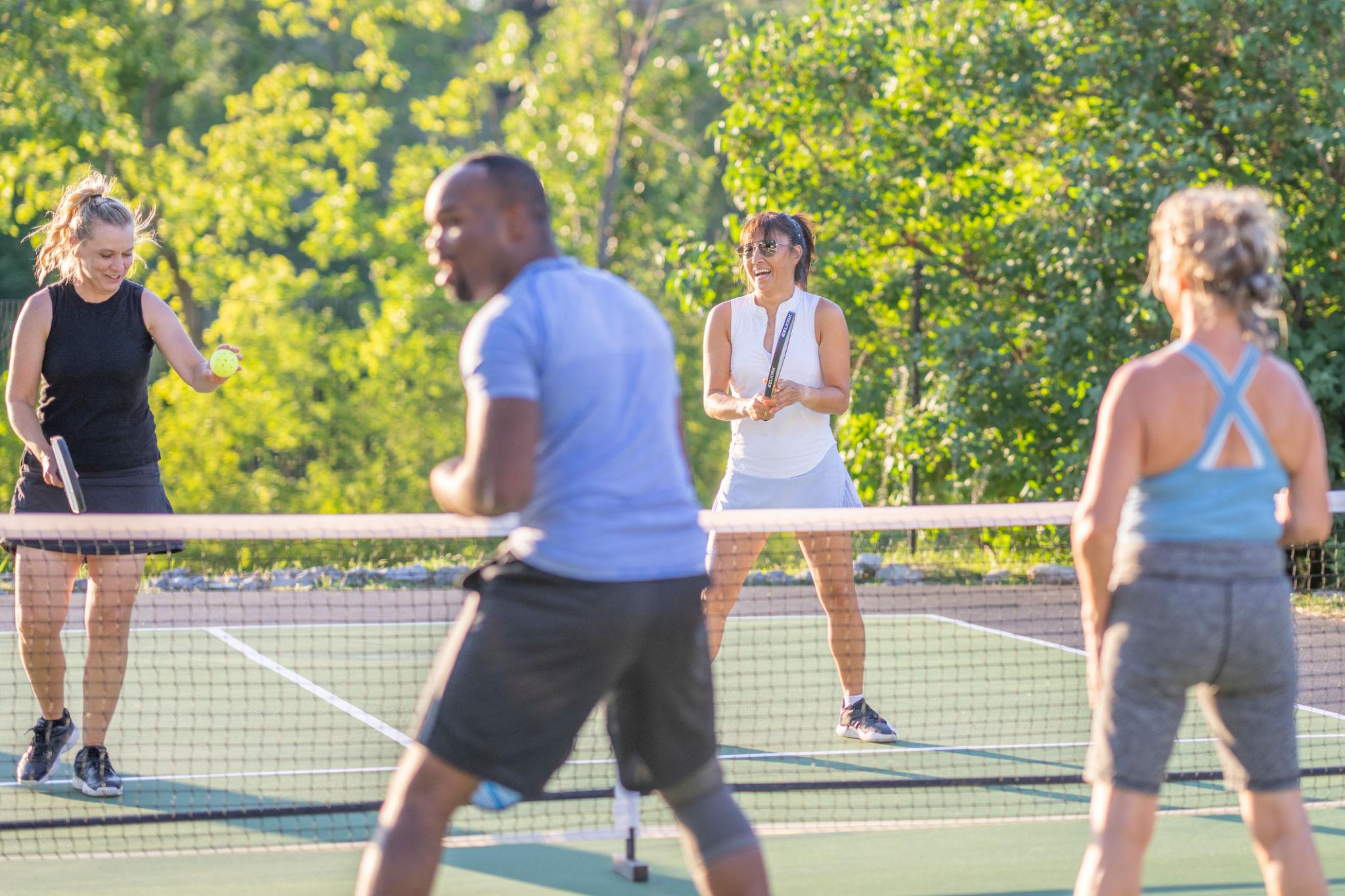 Active adult playing pickleball